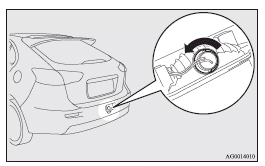 Mitsubishi Lancer: Rear fog lamp. 2. Remove the bulb by pulling it out.