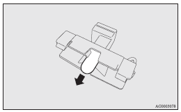 Mitsubishi Lancer: Licence plate lamps. 4. To install the bulb, perform the removal steps in reverse.