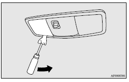 Mitsubishi Lancer: Front room & map lamps. 2. While holding down the tab (A), pull out the bulb.