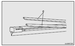 Mitsubishi Lancer: Wiper blade rubber replacement. 4. Insert the wiper blade into the arm, starting with the opposite end of the