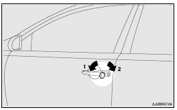 Mitsubishi Lancer: Locking and unlocking the door. 1- Lock