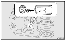 Mitsubishi Lancer: To turn from “ACC” to “LOCK”. 9. After turning the emergency key with the keyless operation key to the “ON”