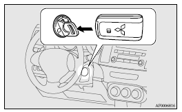 Mitsubishi Lancer: To turn from “ACC” to “LOCK”. 9. Turn the emergency key with keyless operation key to the “ON” position. The