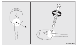 Mitsubishi Lancer: Procedure for replacing the remote control switch battery. 3. With the MITSUBISHI mark facing you, insert the clothcovered tip of a straight