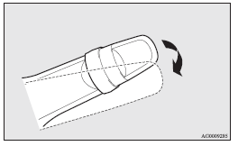 Mitsubishi Lancer: Changing the security alarm settings. 4. After approximately 10 seconds, the buzzer will make a sound. Keep the windscreen