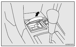 Mitsubishi Lancer: Front ashtray. Front/Rear ashtray (moveable)