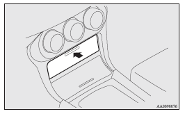 Mitsubishi Lancer: Front console box. Note