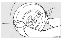 Mitsubishi Lancer: To change a tyre. 7. Finger-tighten the wheel nuts.