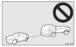 Mitsubishi Lancer: Emergency towing. Operation under adverse driving conditions